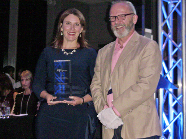 Lindsay Sutherland (Nova Scotia Health) receives Project of the Year Award from Bruce Gilbert